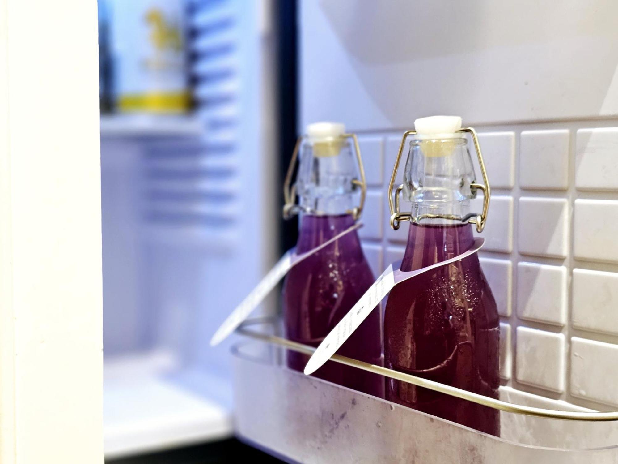 The Sukosol Hotel Bangkok Eksteriør billede Bottles of blueberry juice